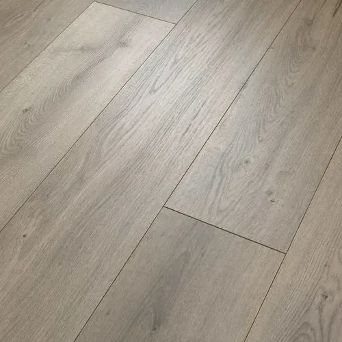 Light gray laminate wood flooring, showing planks with wood grain texture.