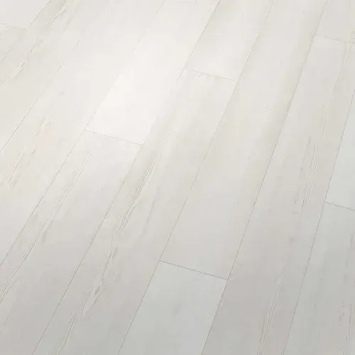 Light-colored wooden floorboards in a diagonal pattern.