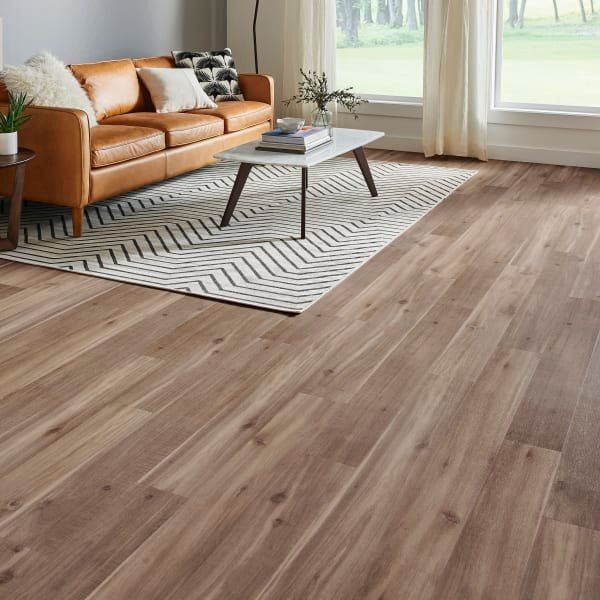 A living room with a couch and a coffee table