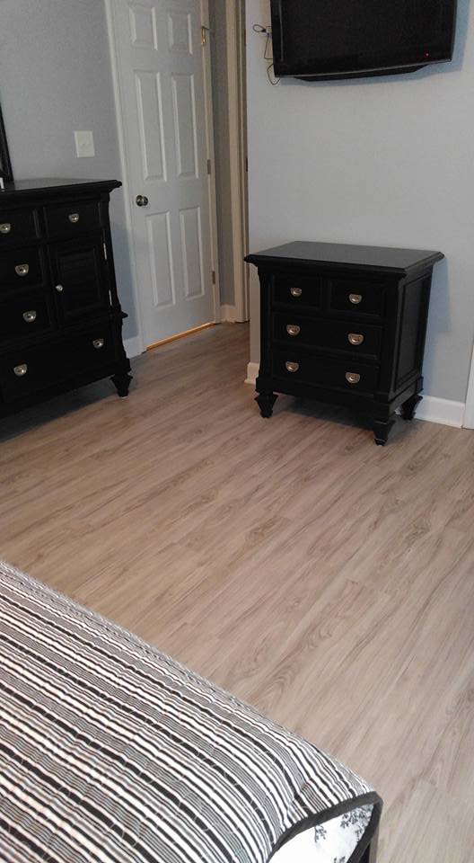 Bedroom in hardwood flooring
