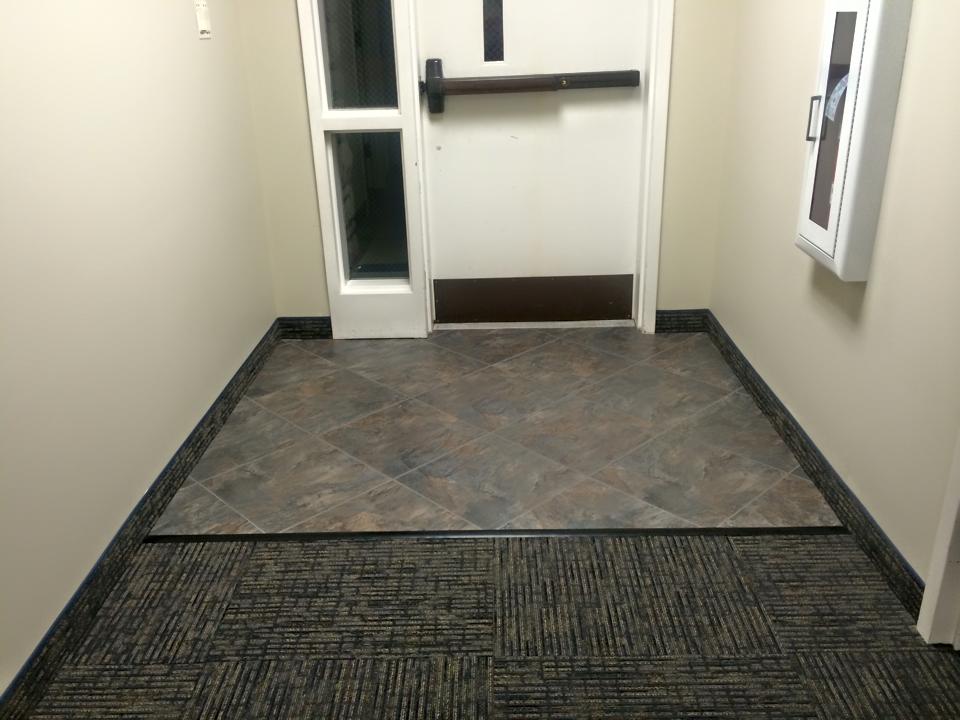 Tiles and carpet flooring