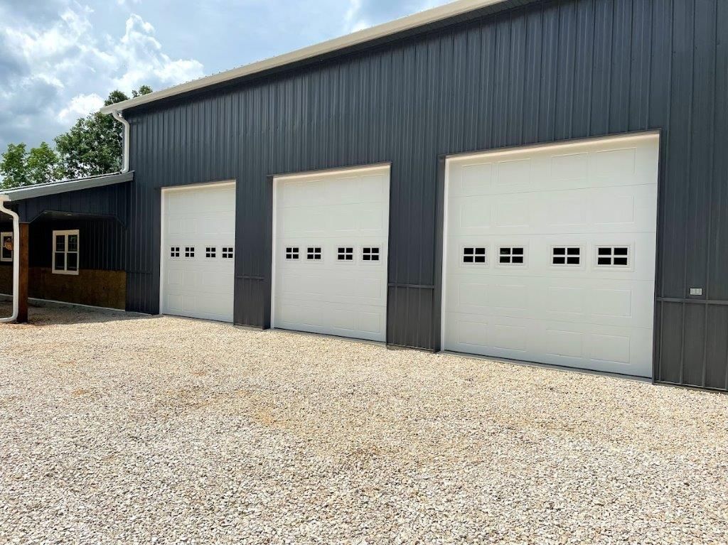 A garage with three garage doors