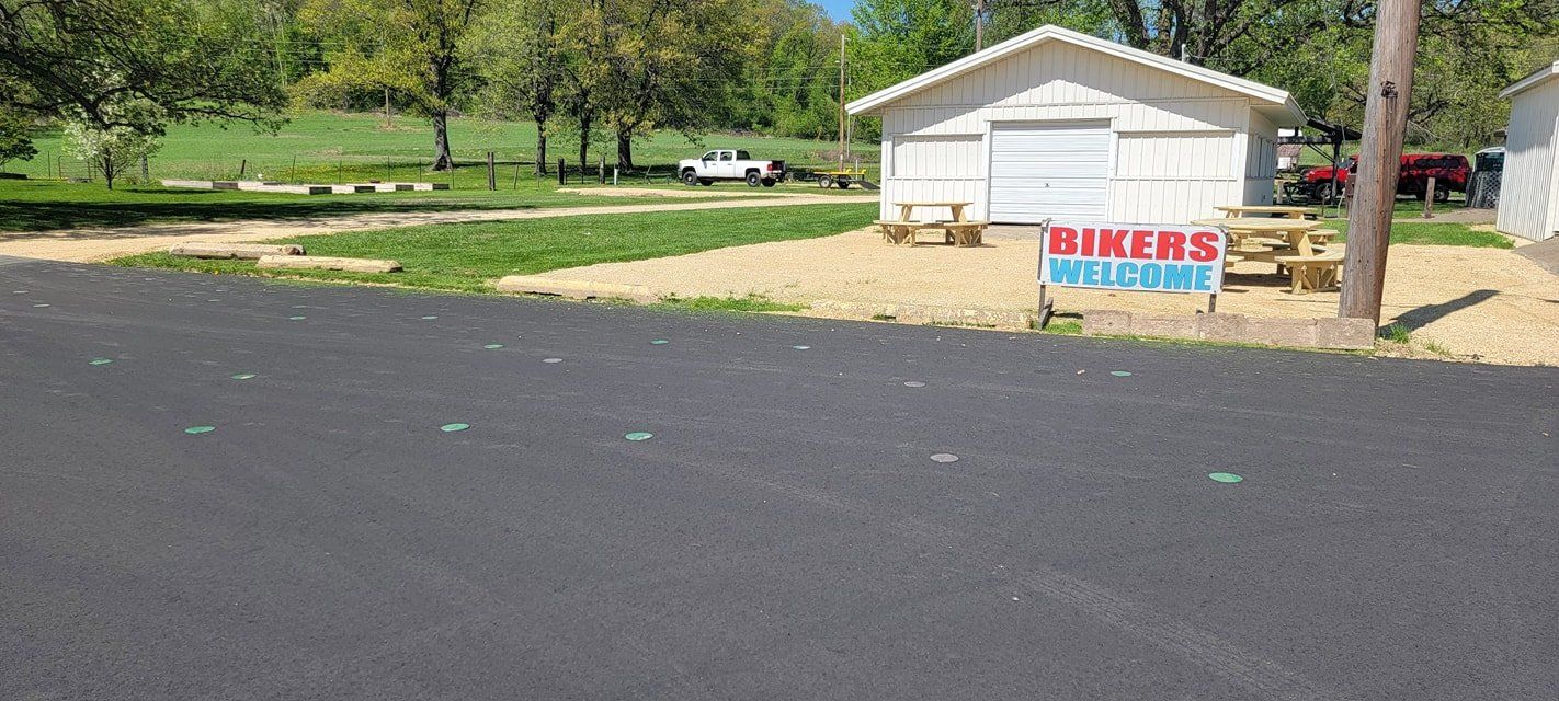 A parking lot with a sign that says bikers welcome