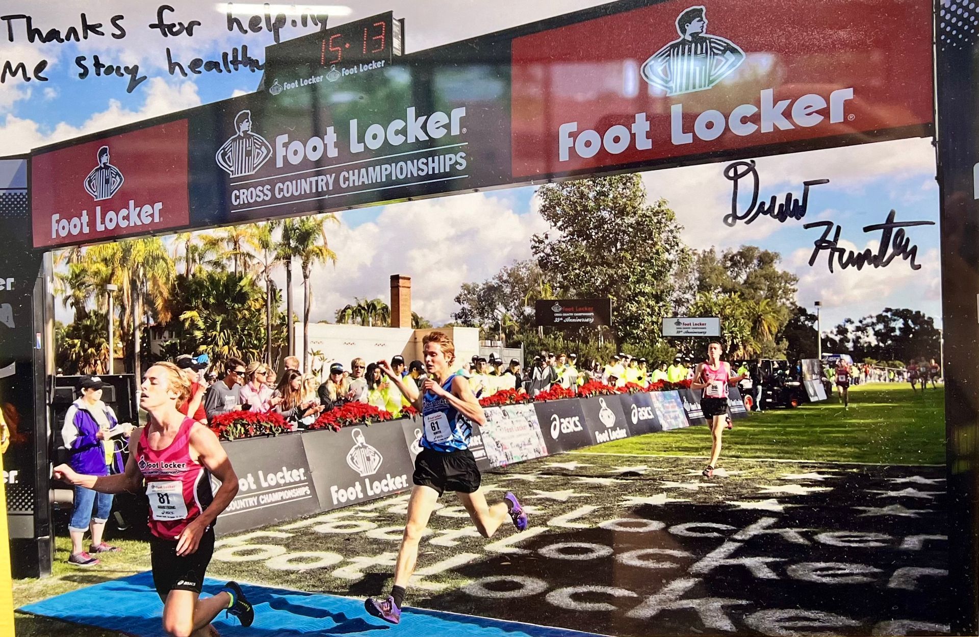 A picture of people running in a foot locker race