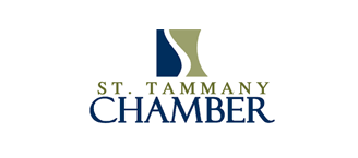 Logo of St. Tammany Chamber. Navy and olive-colored abstract shape above the words 