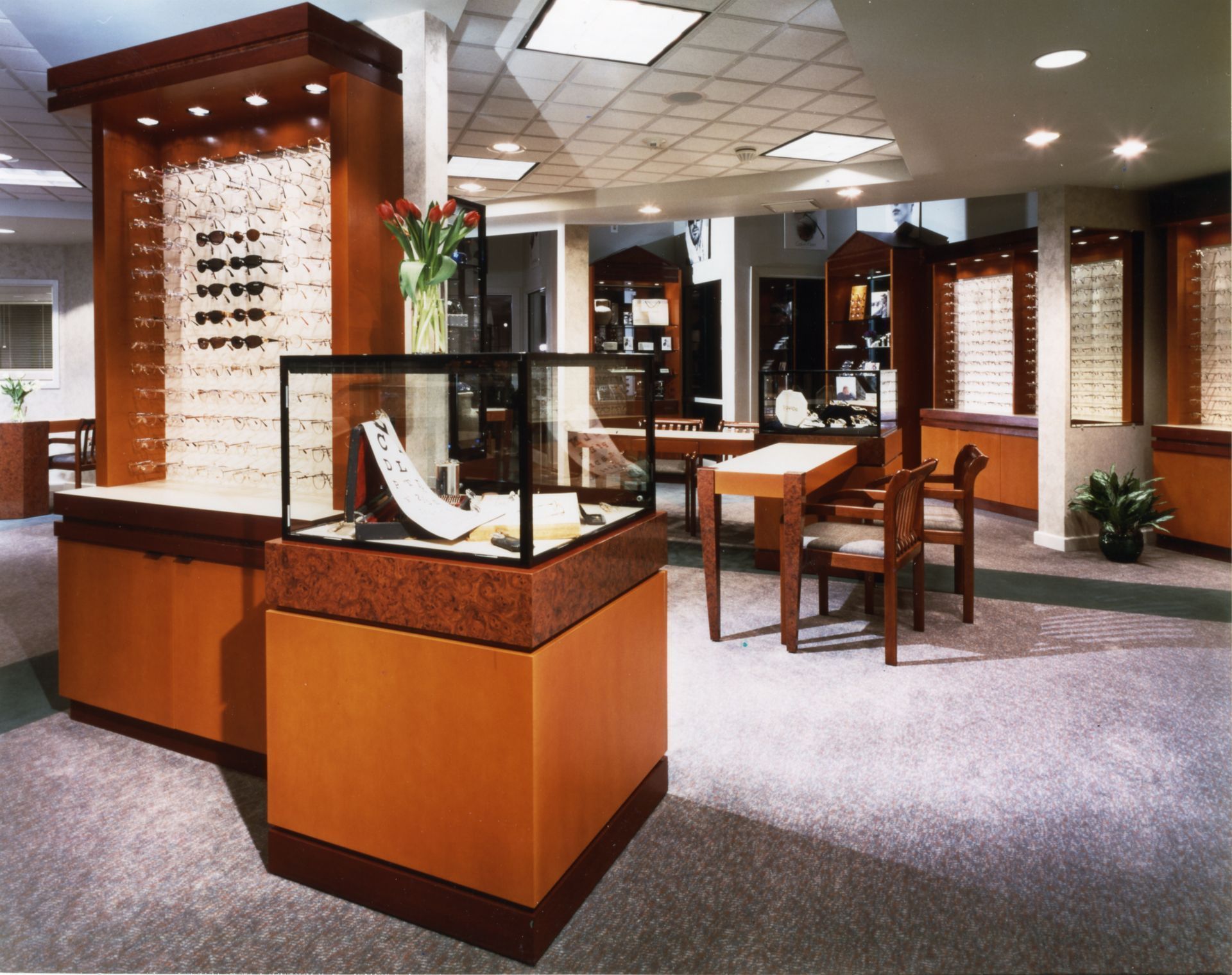 An optical store with a display of glasses and jewelry