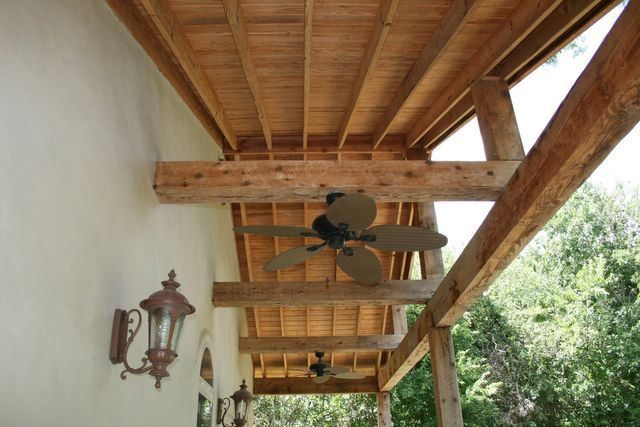 A ceiling fan is hanging from the ceiling of a house