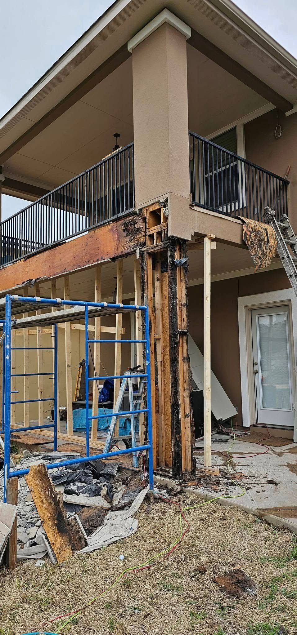 A house is being demolished to make way for a new deck.
