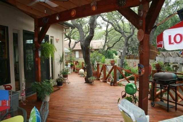 A wooden deck with a sign that says lo on it