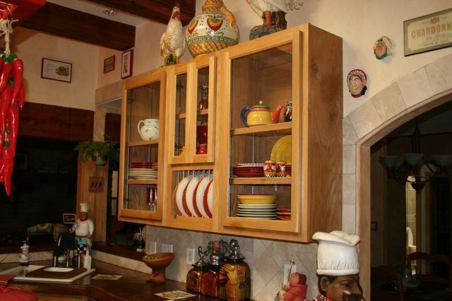 A kitchen with a statue of a chef on the counter