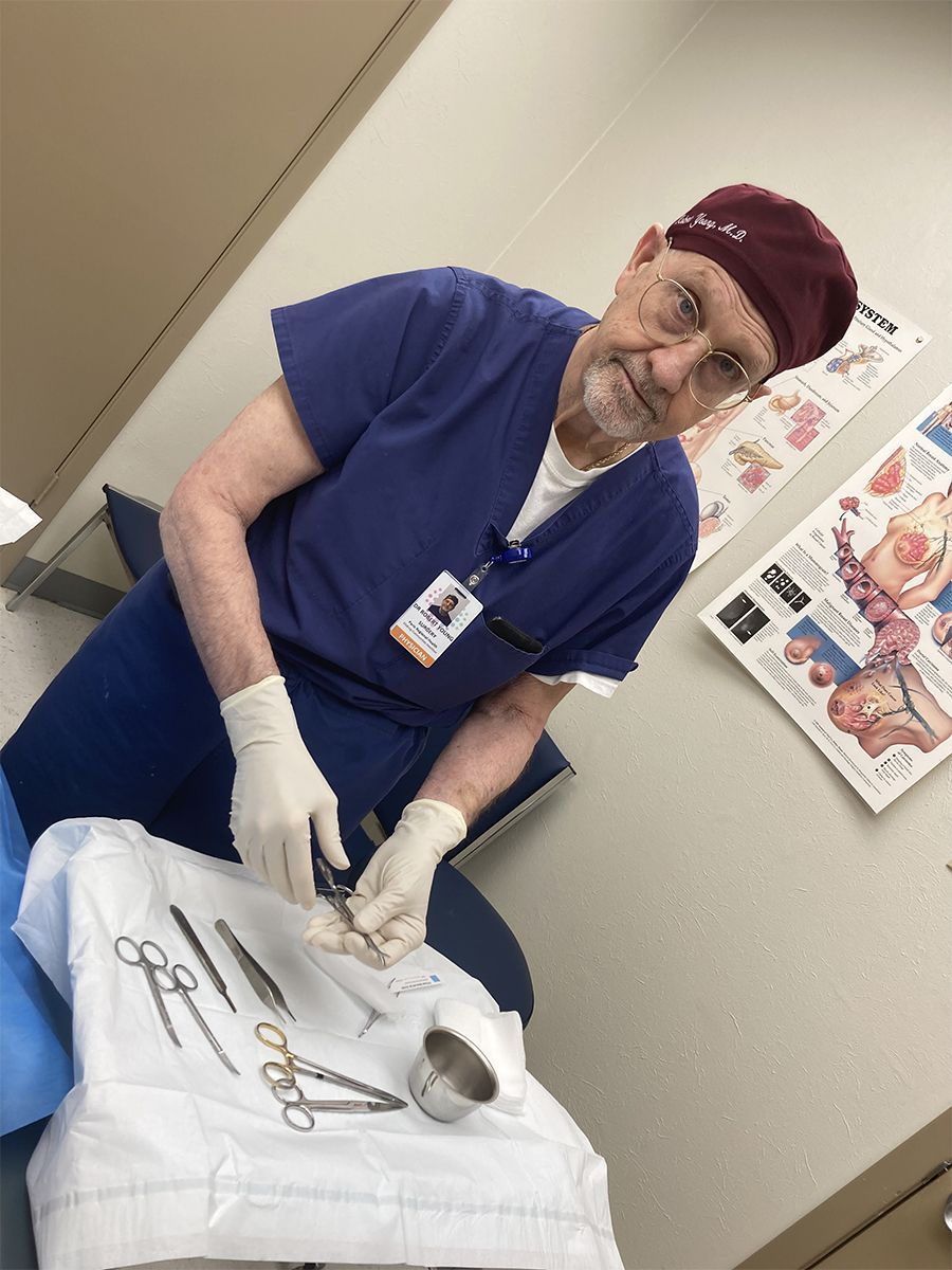 Physician laying medical tools