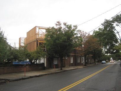 A building is being built on the side of the road