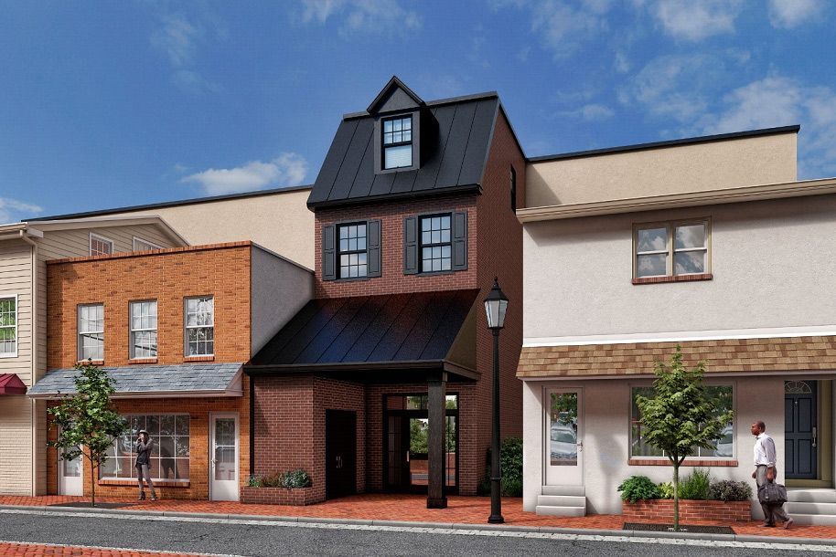 An artist's impression of a small town with a brick building in the middle.