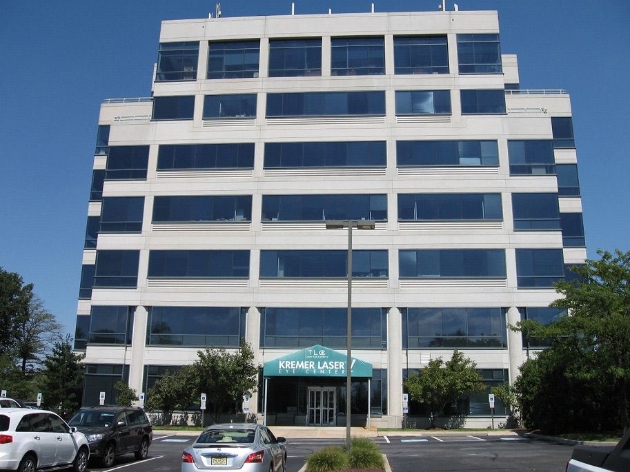 A large building with a blue awning
