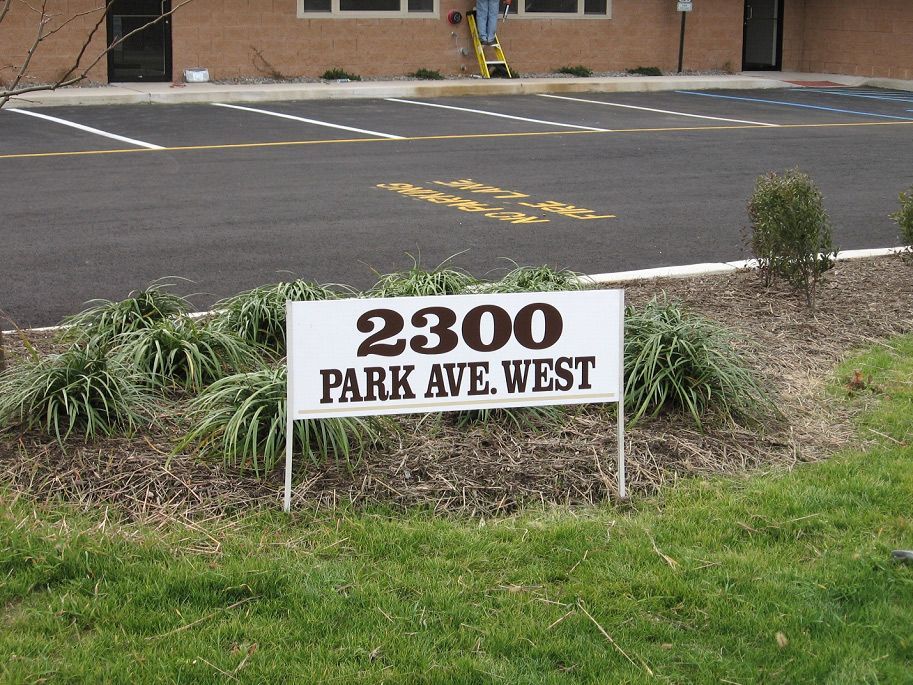 A sign that says 2300 Park Ave West on it