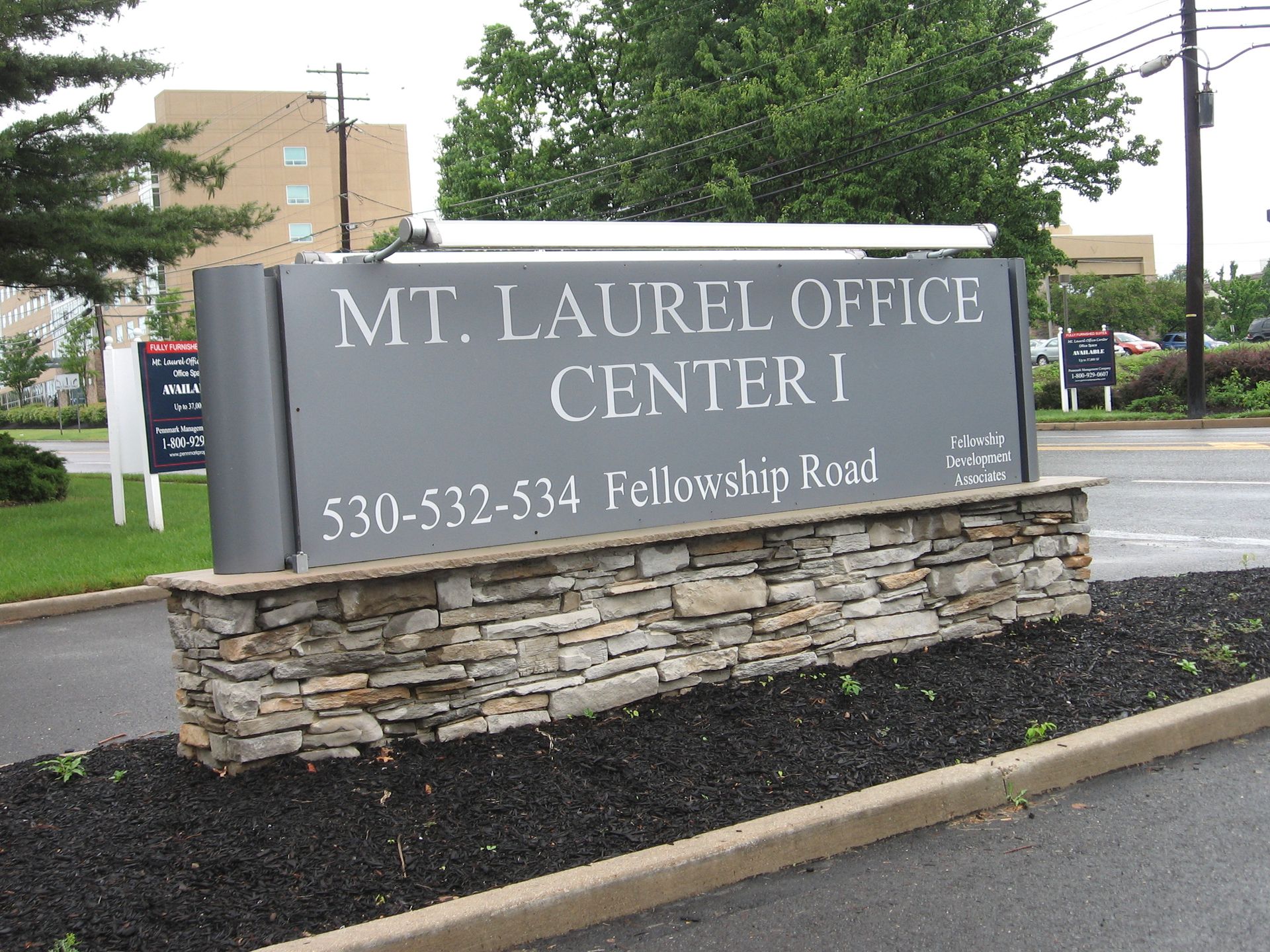 A sign for Mt. Laurel Office Center 1