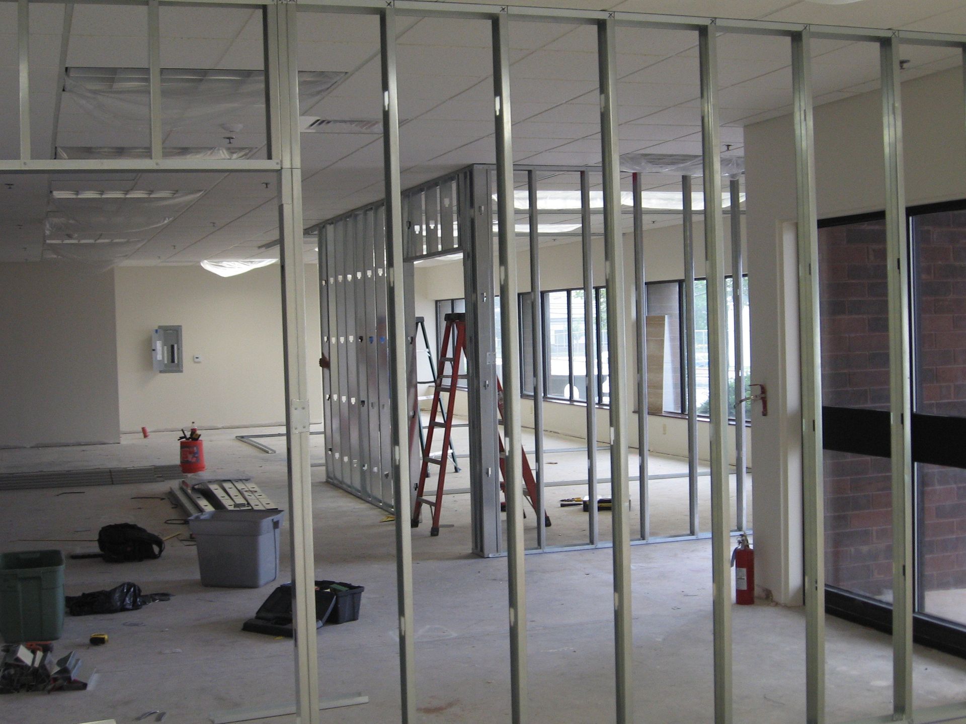 An image of a room with a ladder in the middle of it