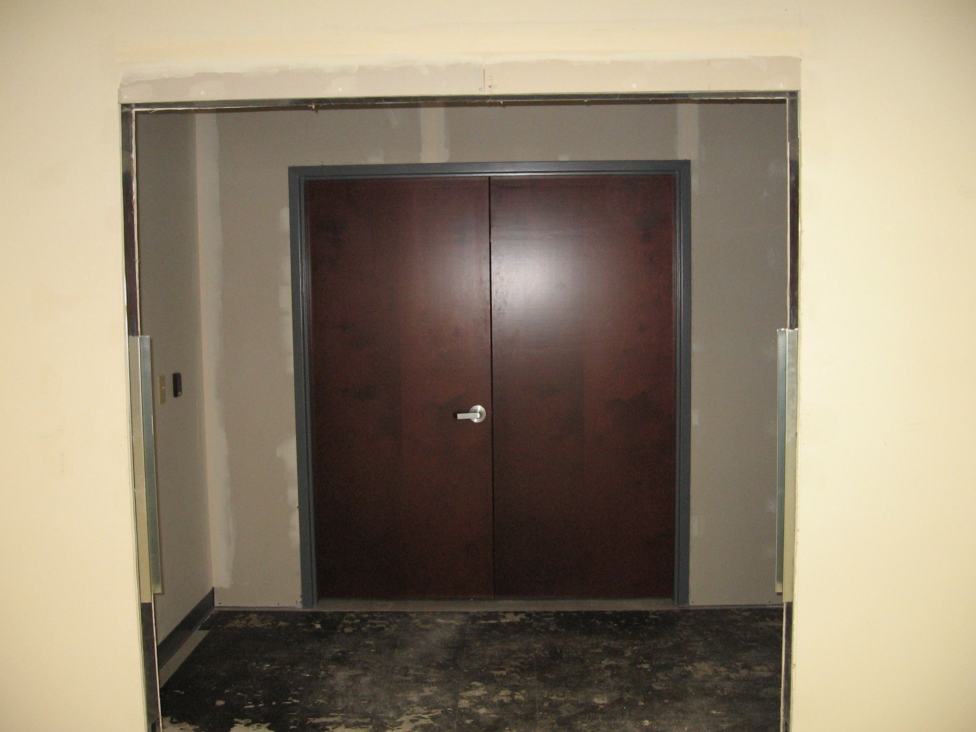 A door that is open and has a handle on it