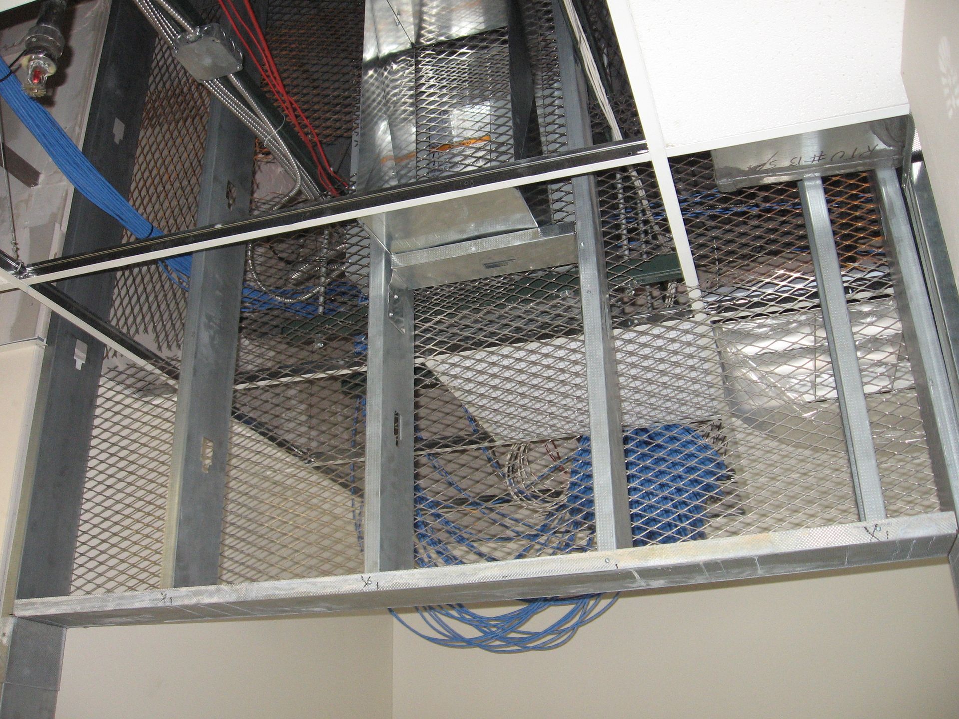 A room with a ceiling that is being remodeled