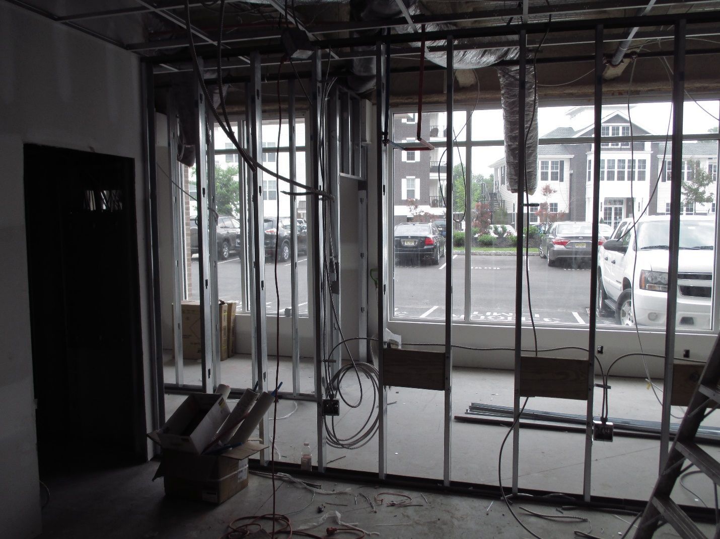 A building under construction with a lot of windows.