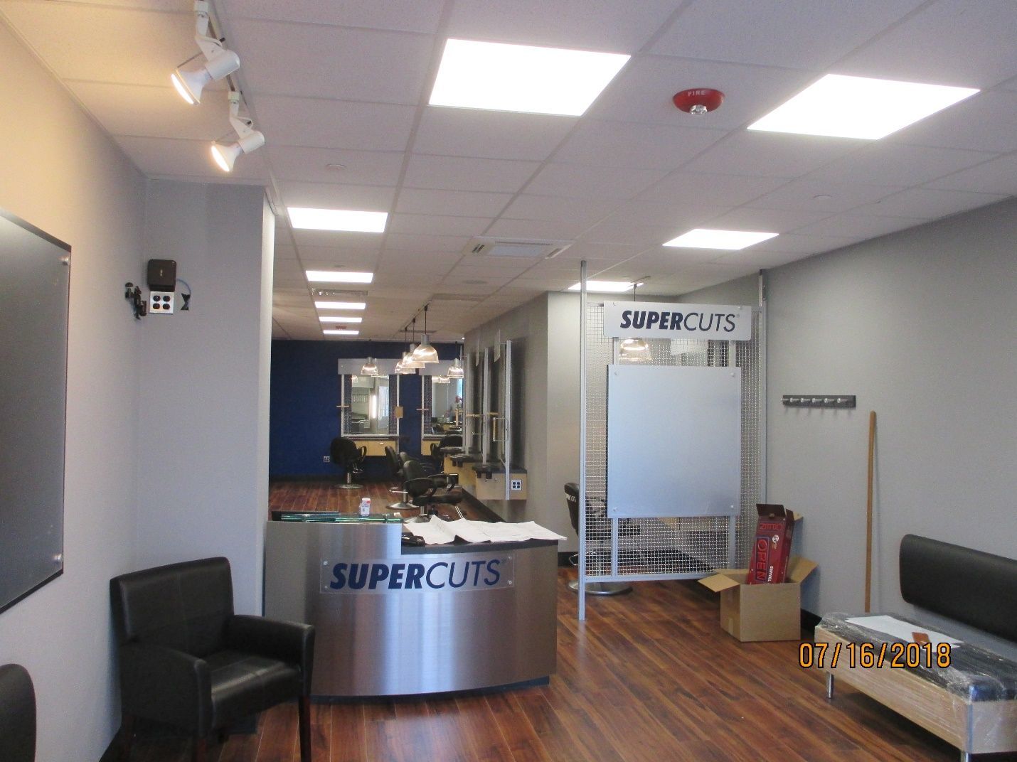 The interior of a supercuts hair salon.