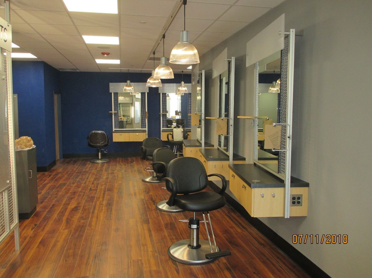 A photo of a hair salon was taken on 09/11/2013.