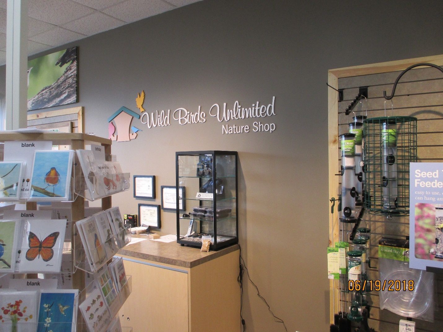 A store with a sign that says wild birds unlimited.
