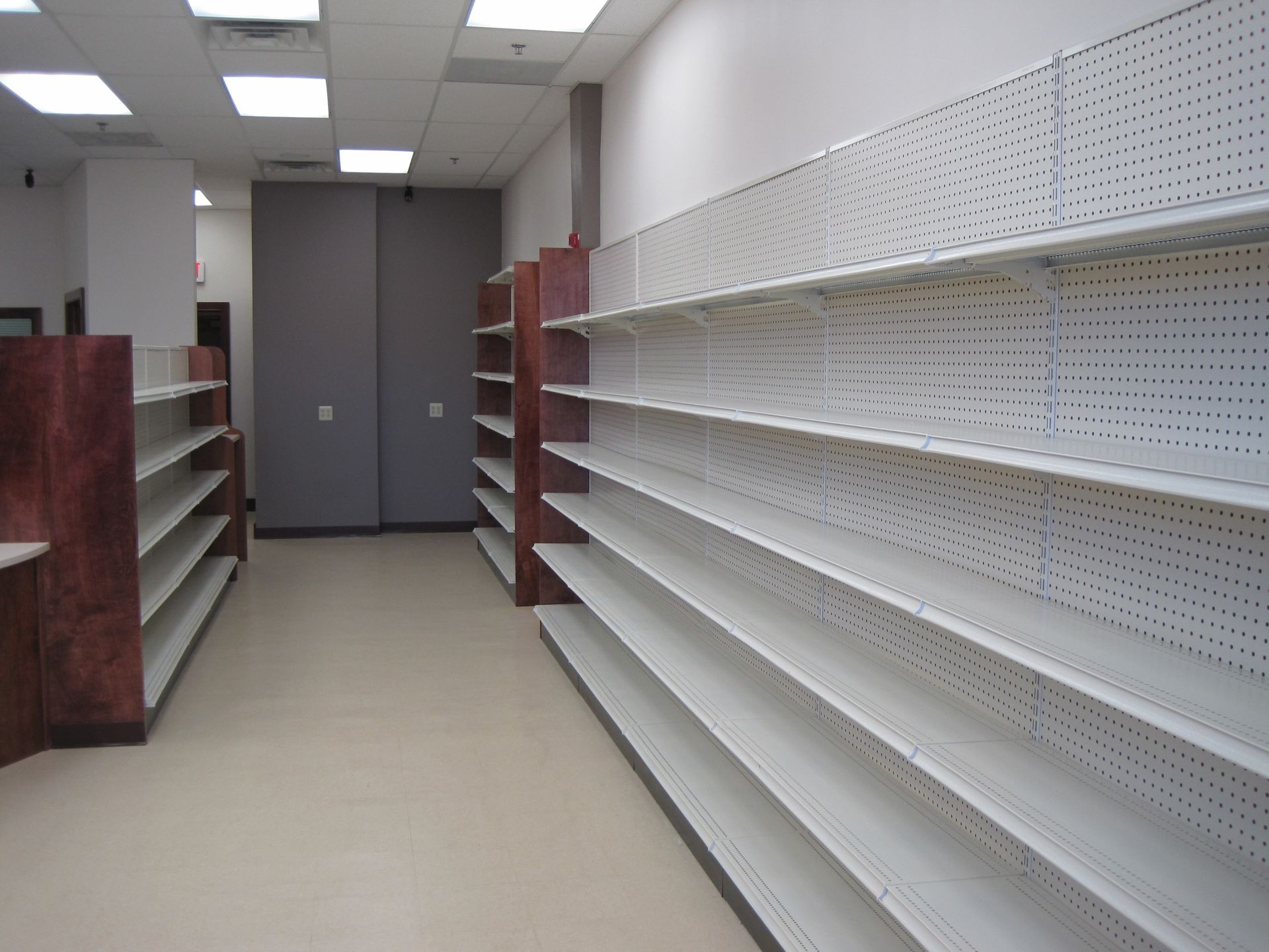 A row of empty shelves in a store