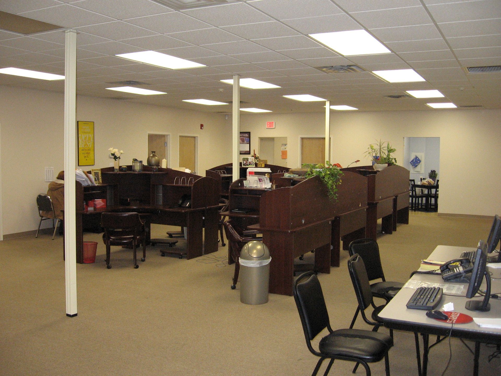 A large office with a lot of desks and chairs