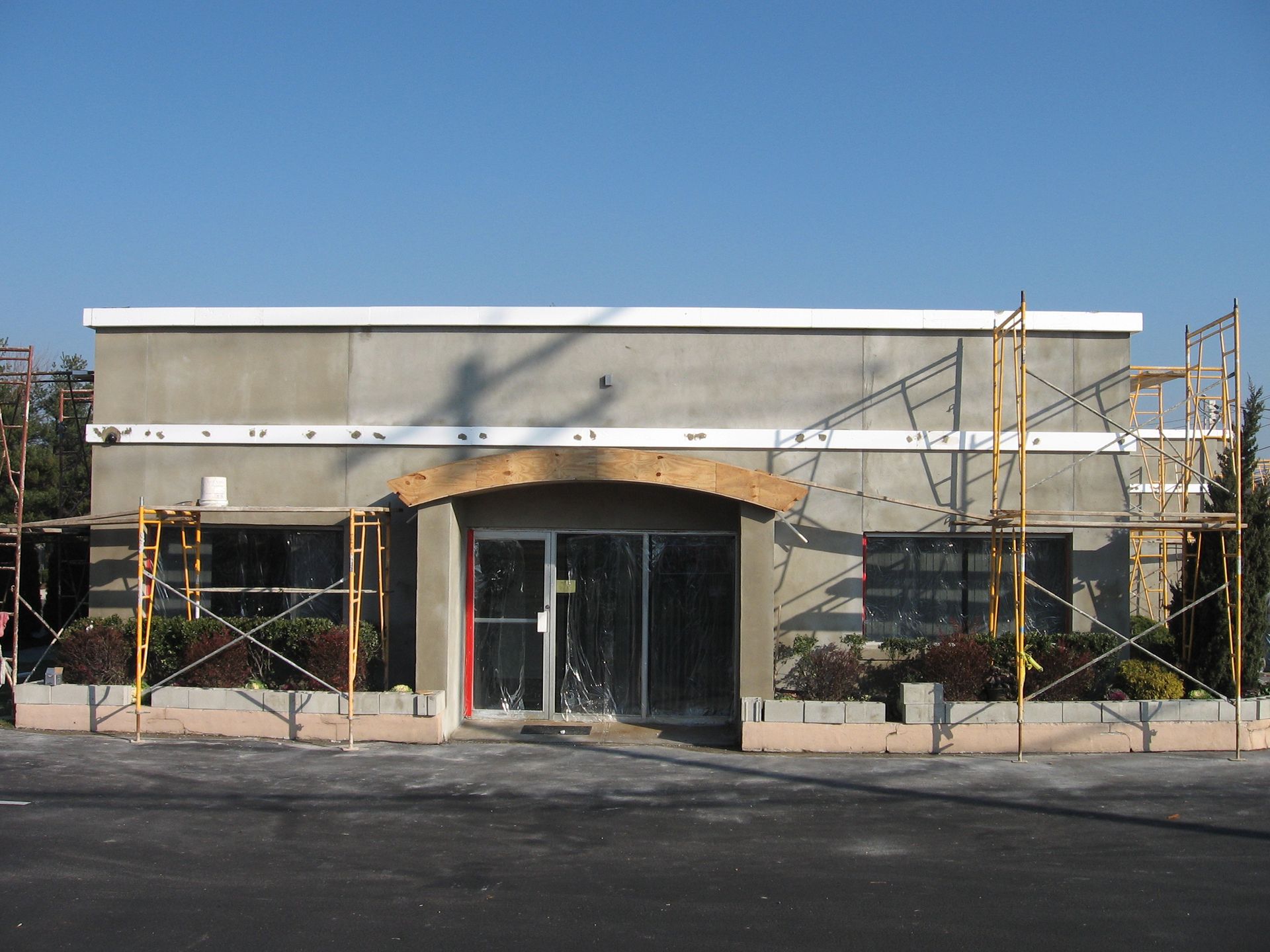 A building under construction with scaffolding around it