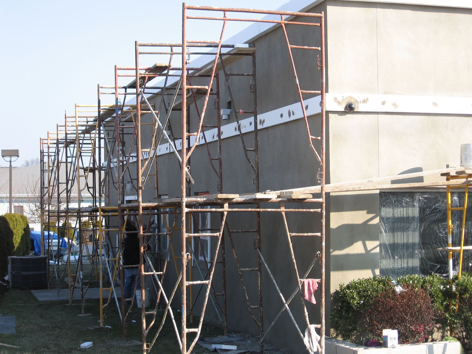 A row of scaffolding on the side of a building