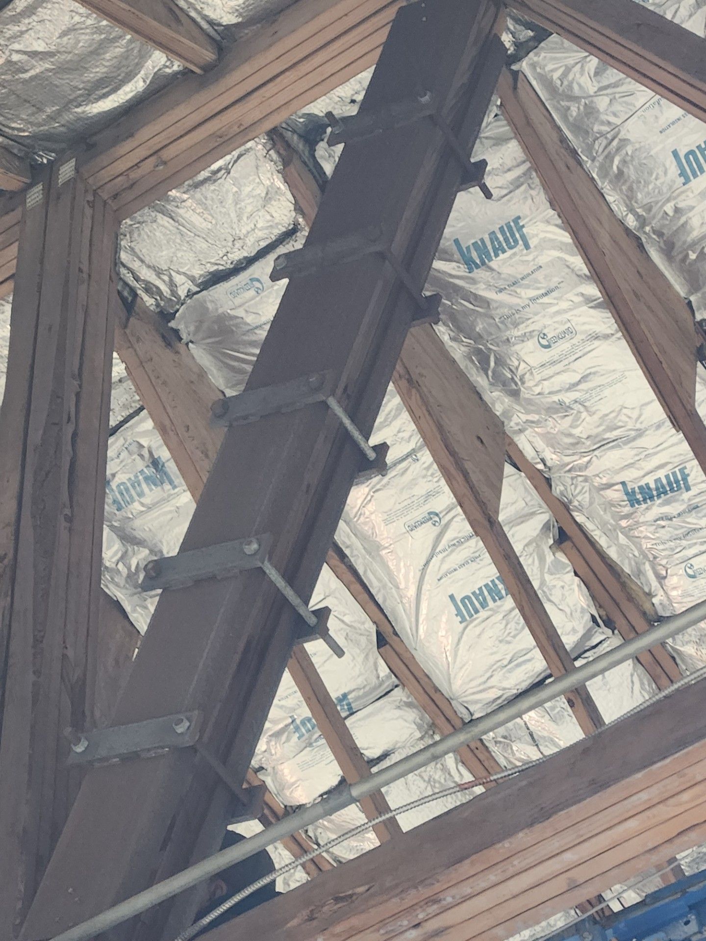 A close up of a roof with aluminum foil on it