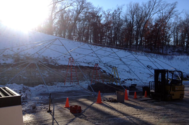 Construction tents being constructed