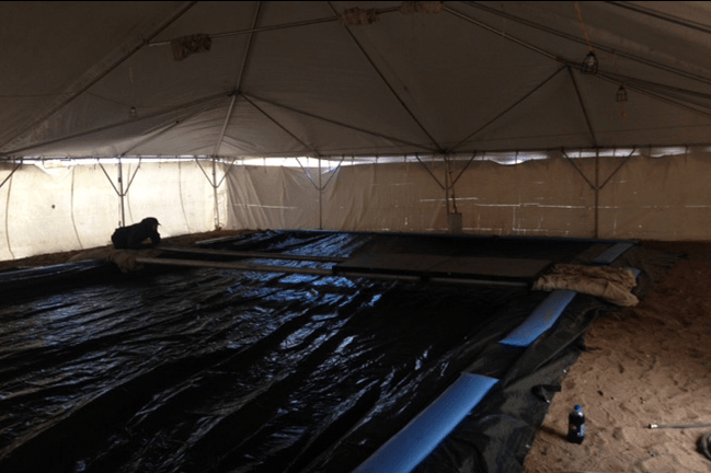 Inside a construction tent