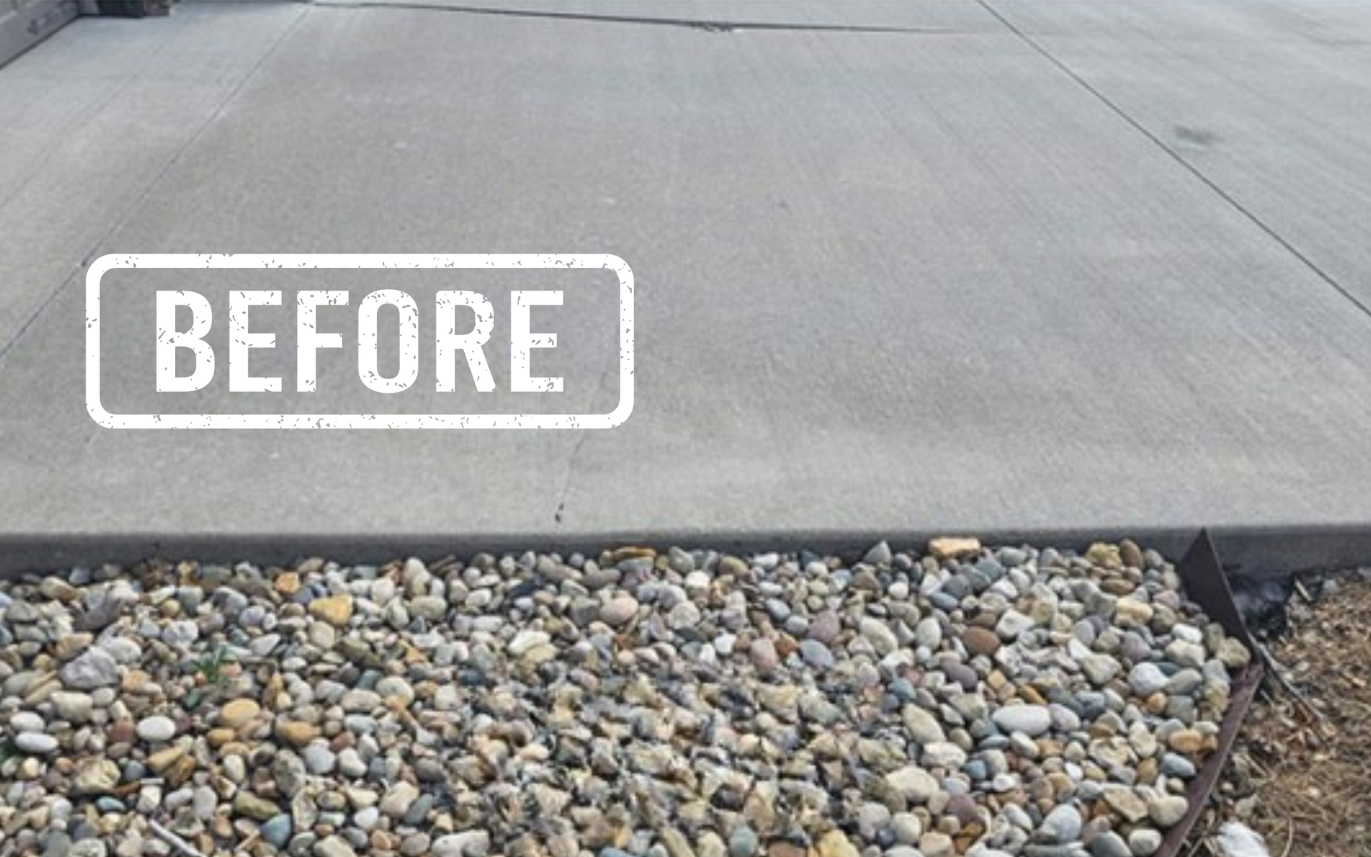 Concrete driveway edge beside a pebble bed