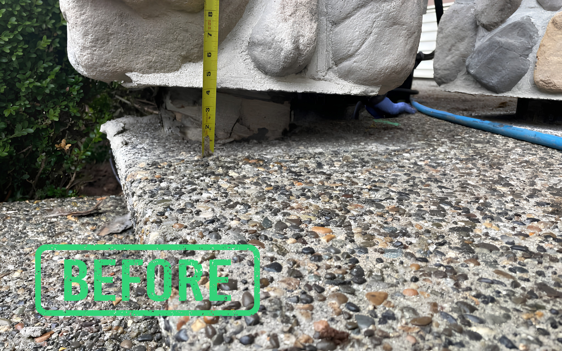 Measured the stone slab edge with a yellow tape measure
