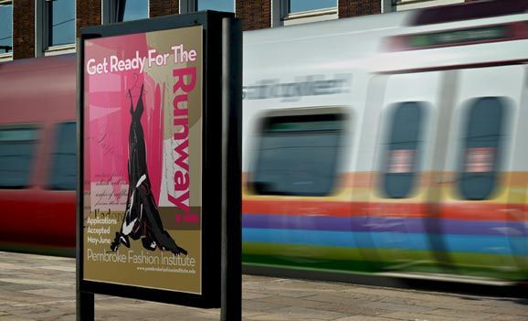 A bus stop with a sign that says get ready for the runway
