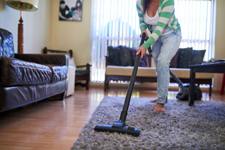 Woman vacuuming
