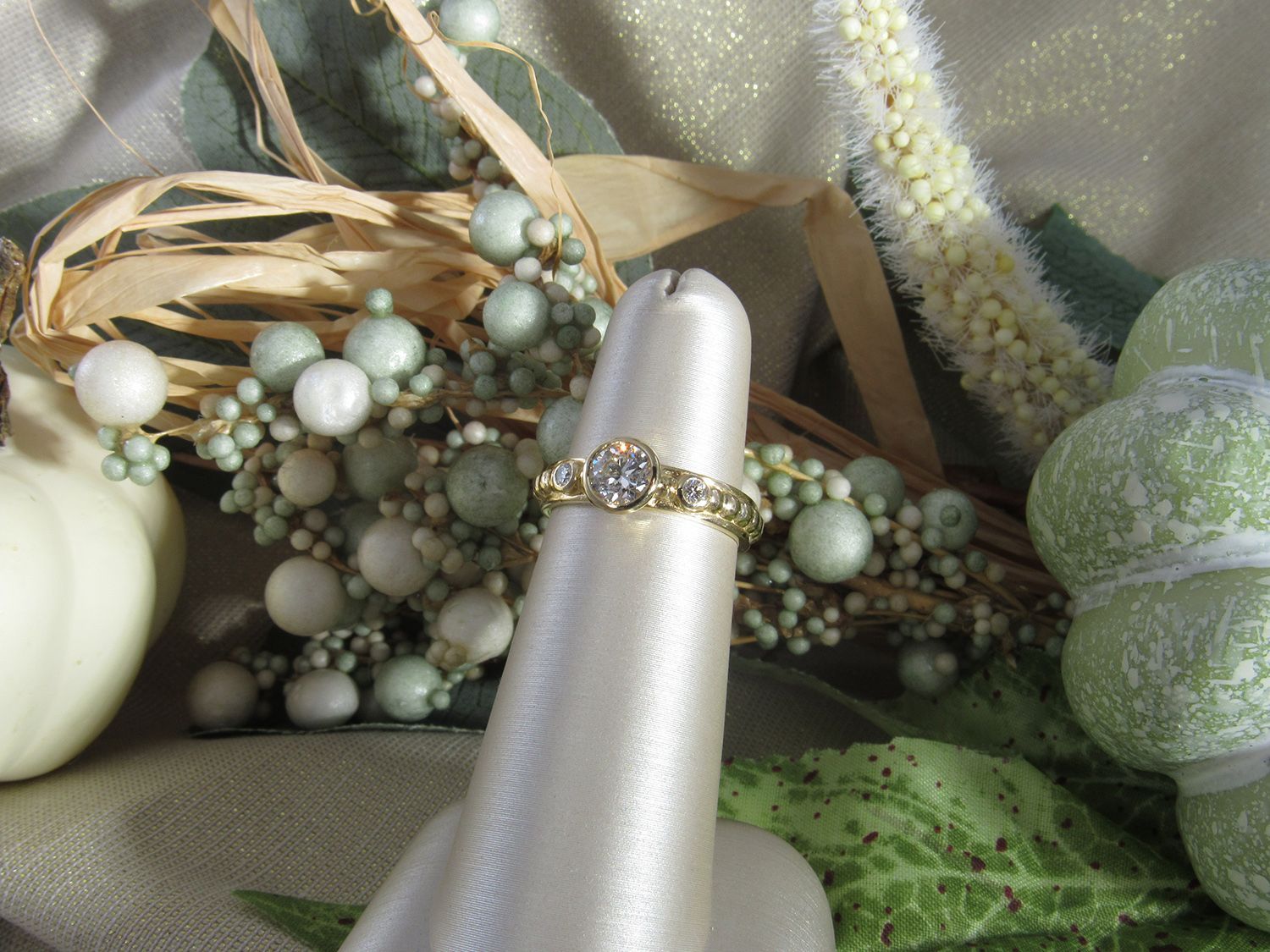 A gold ring with a diamonds on it