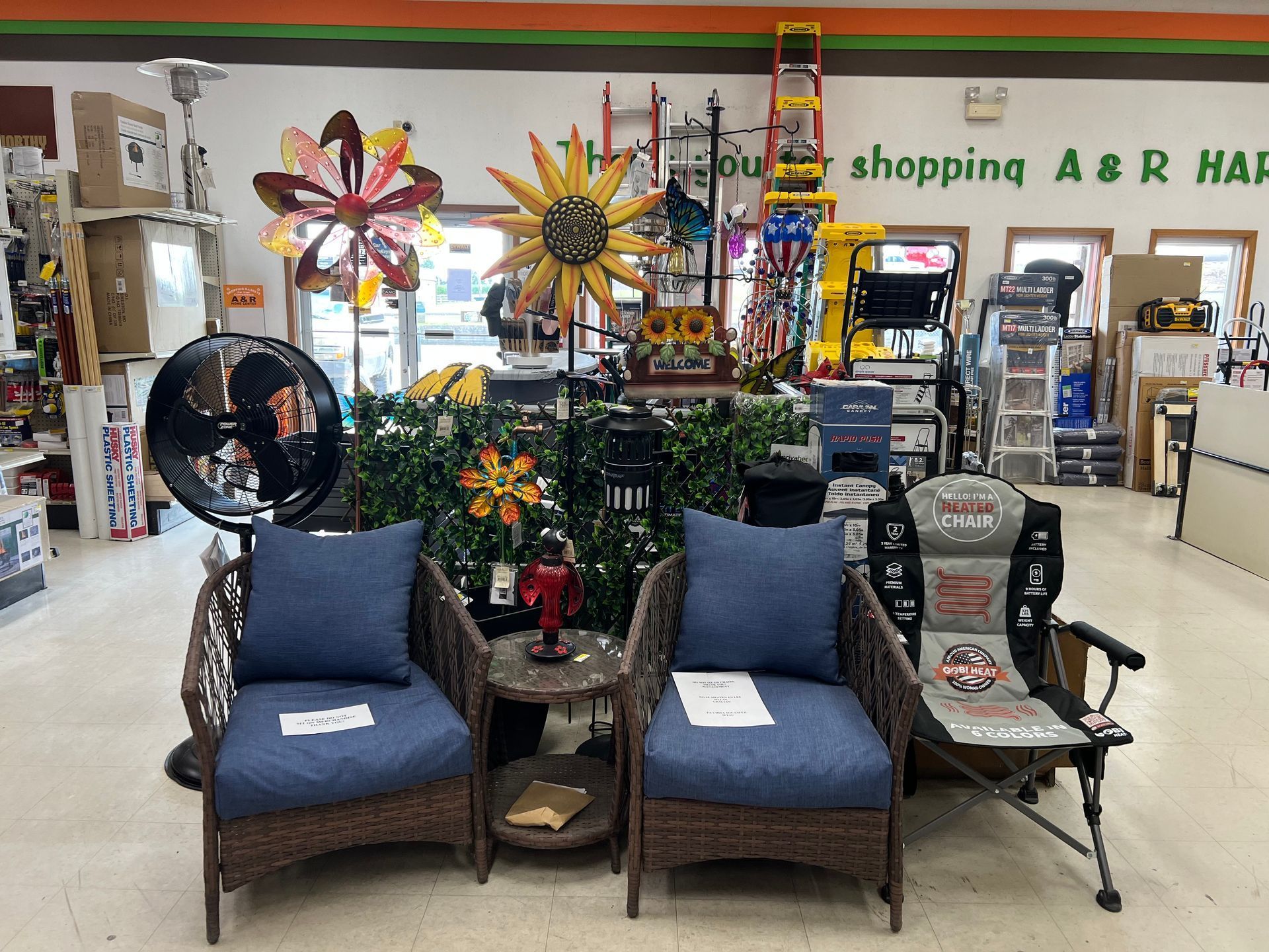 A store filled with furniture and a sign that says shopping aerial