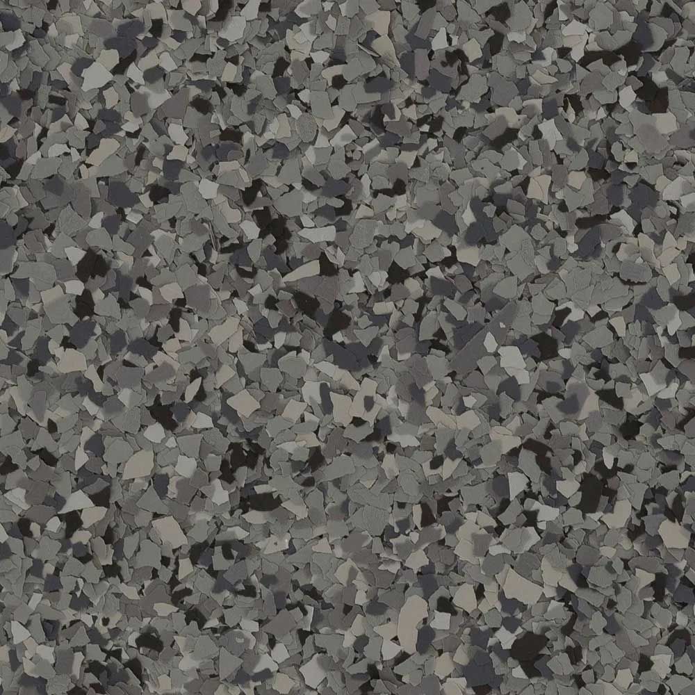 Close-up of a speckled, multi-toned gray flooring surface.