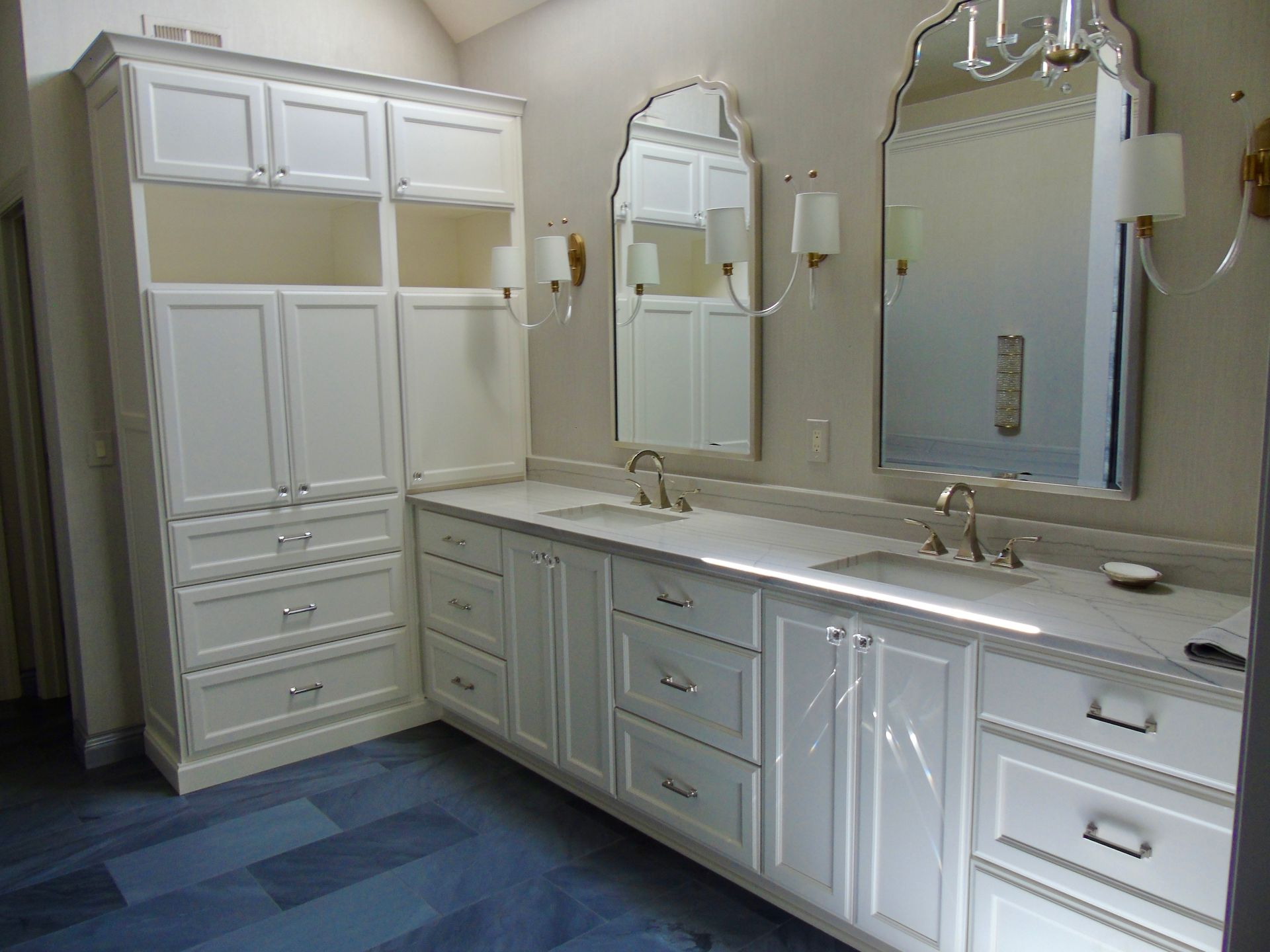 A bathroom with two sinks and two mirrors.
