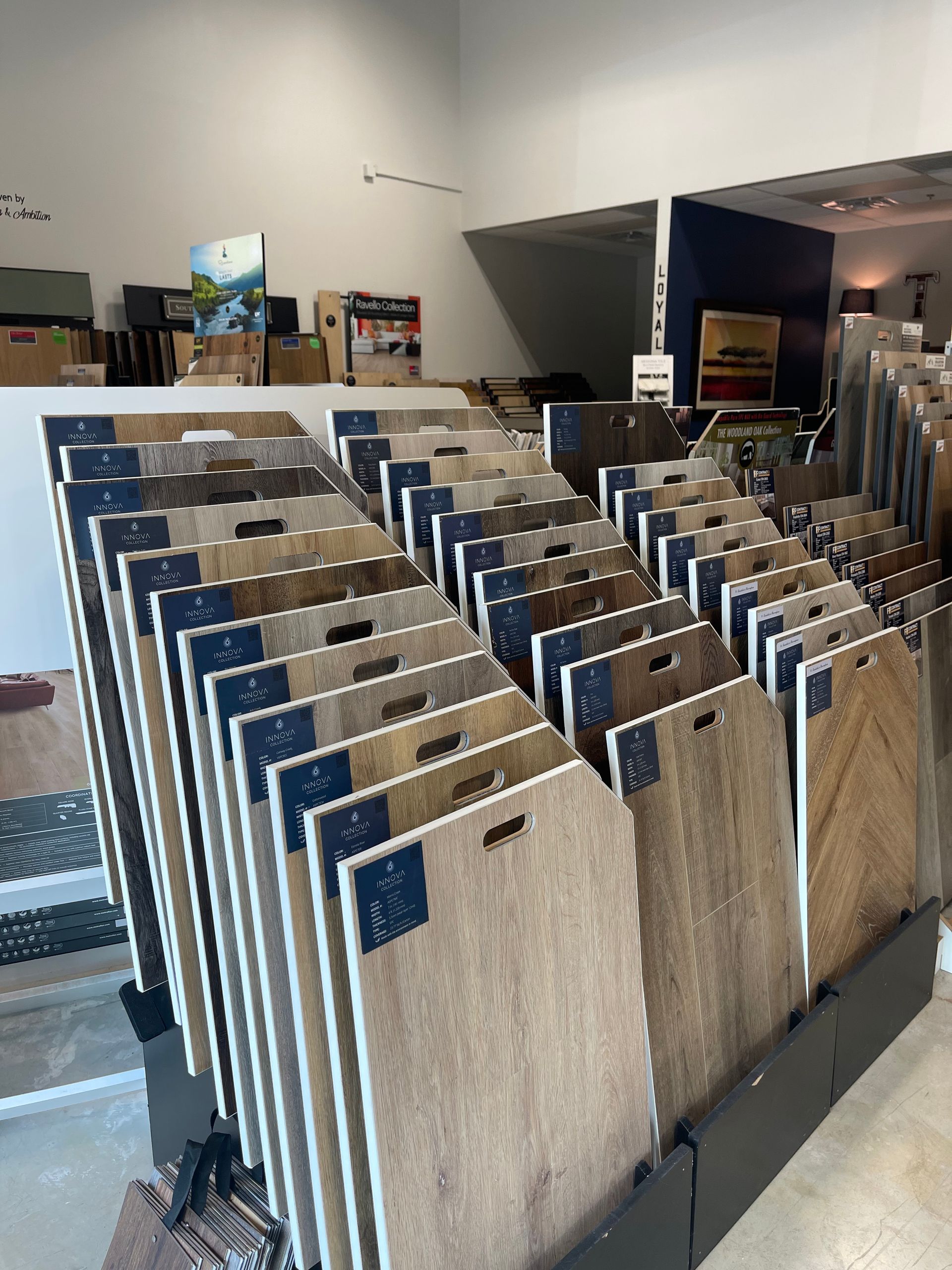 A display of wooden flooring samples in a store.