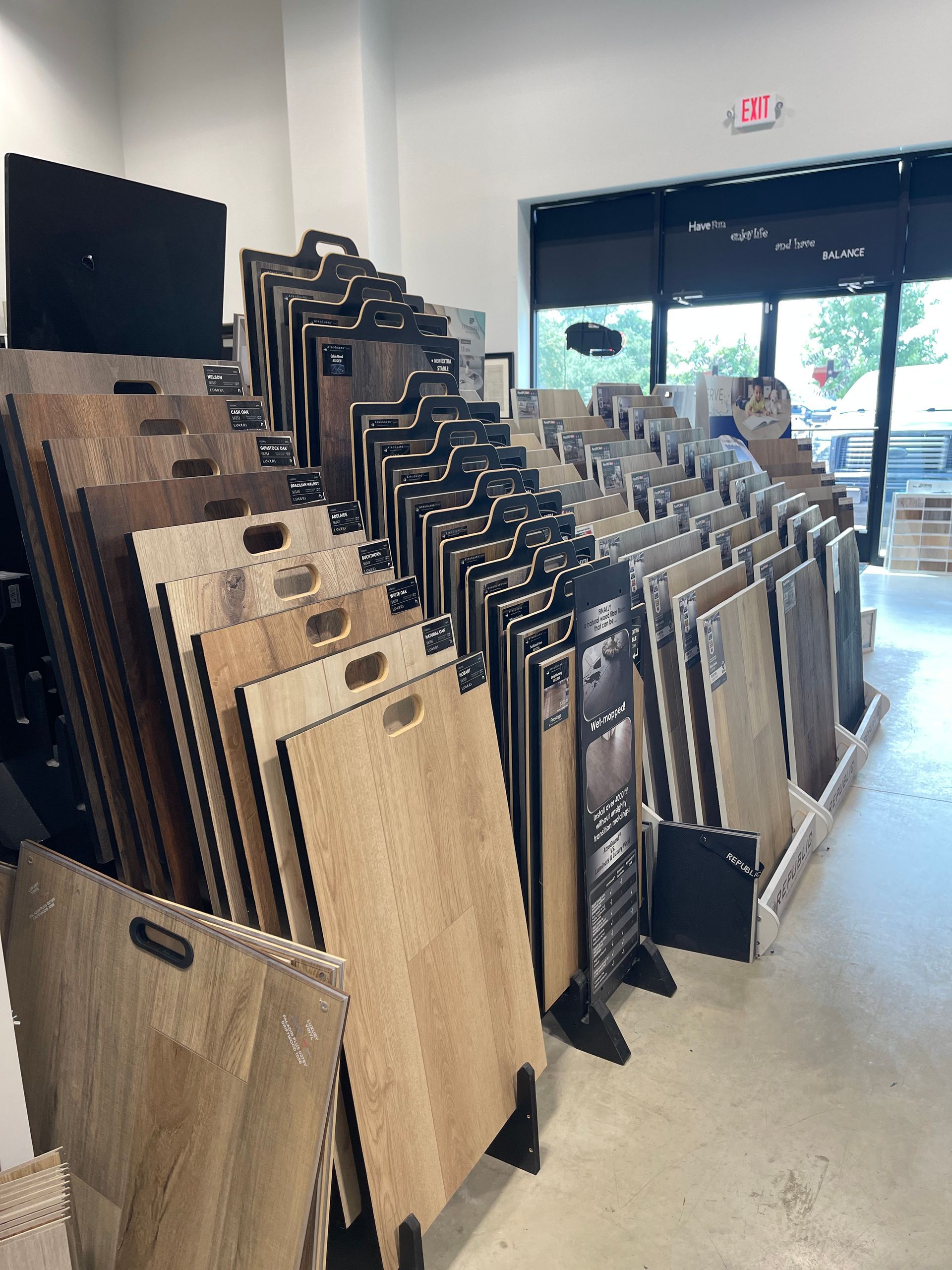 A store filled with lots of different types of wooden flooring.