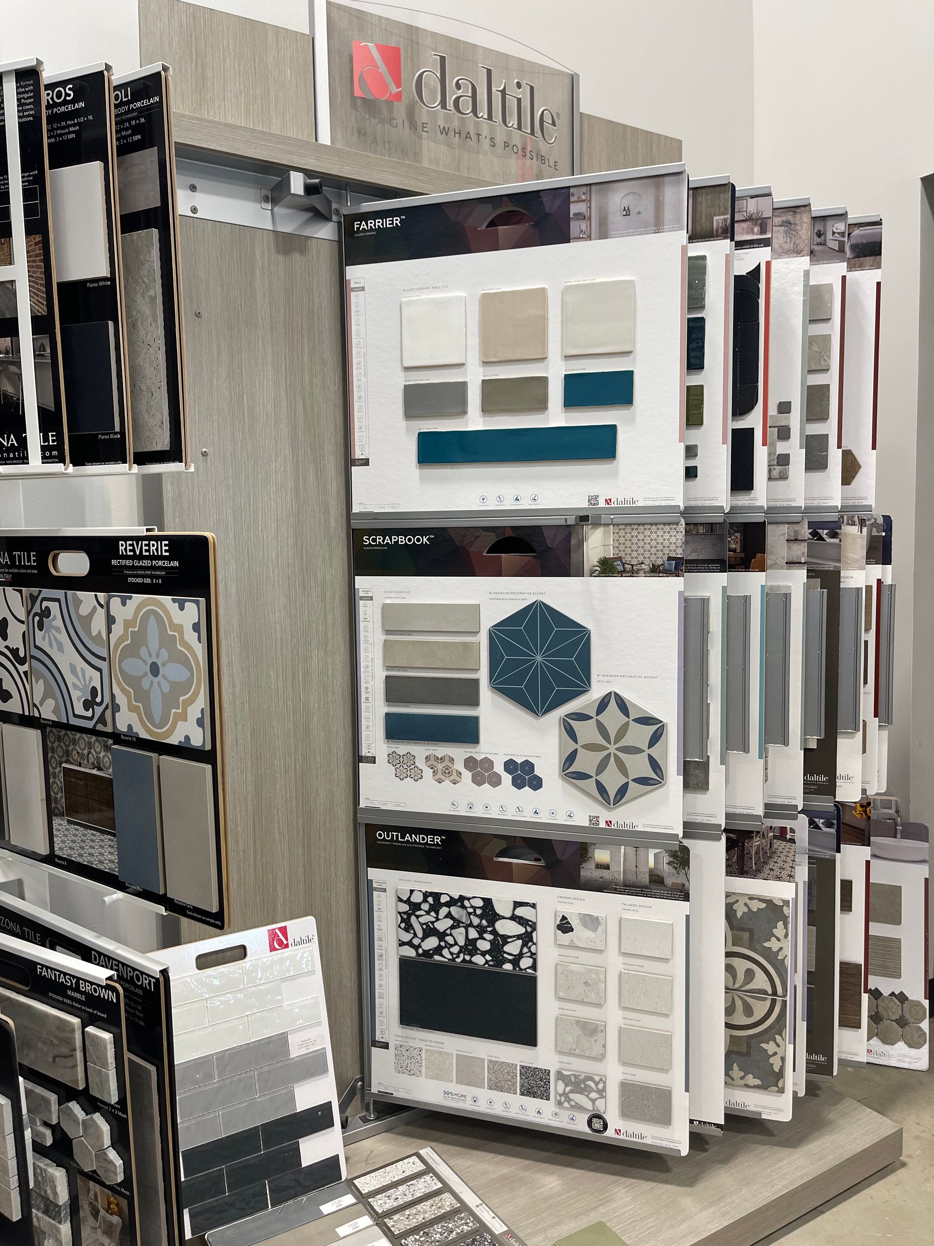 A display of tiles and carpets in a store.