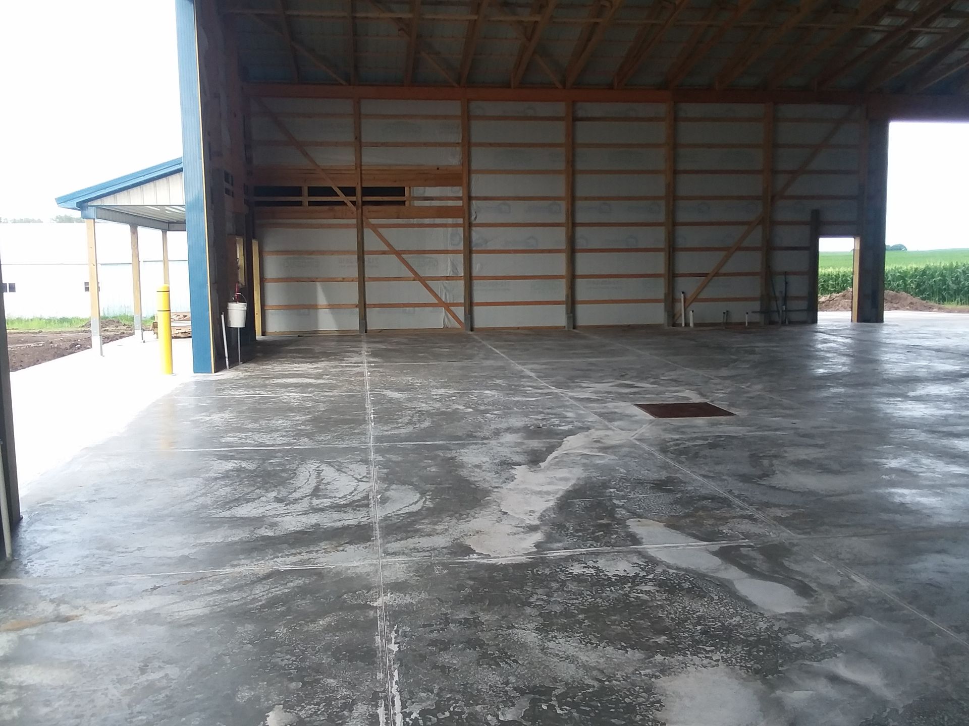 The inside of a building with a concrete floor