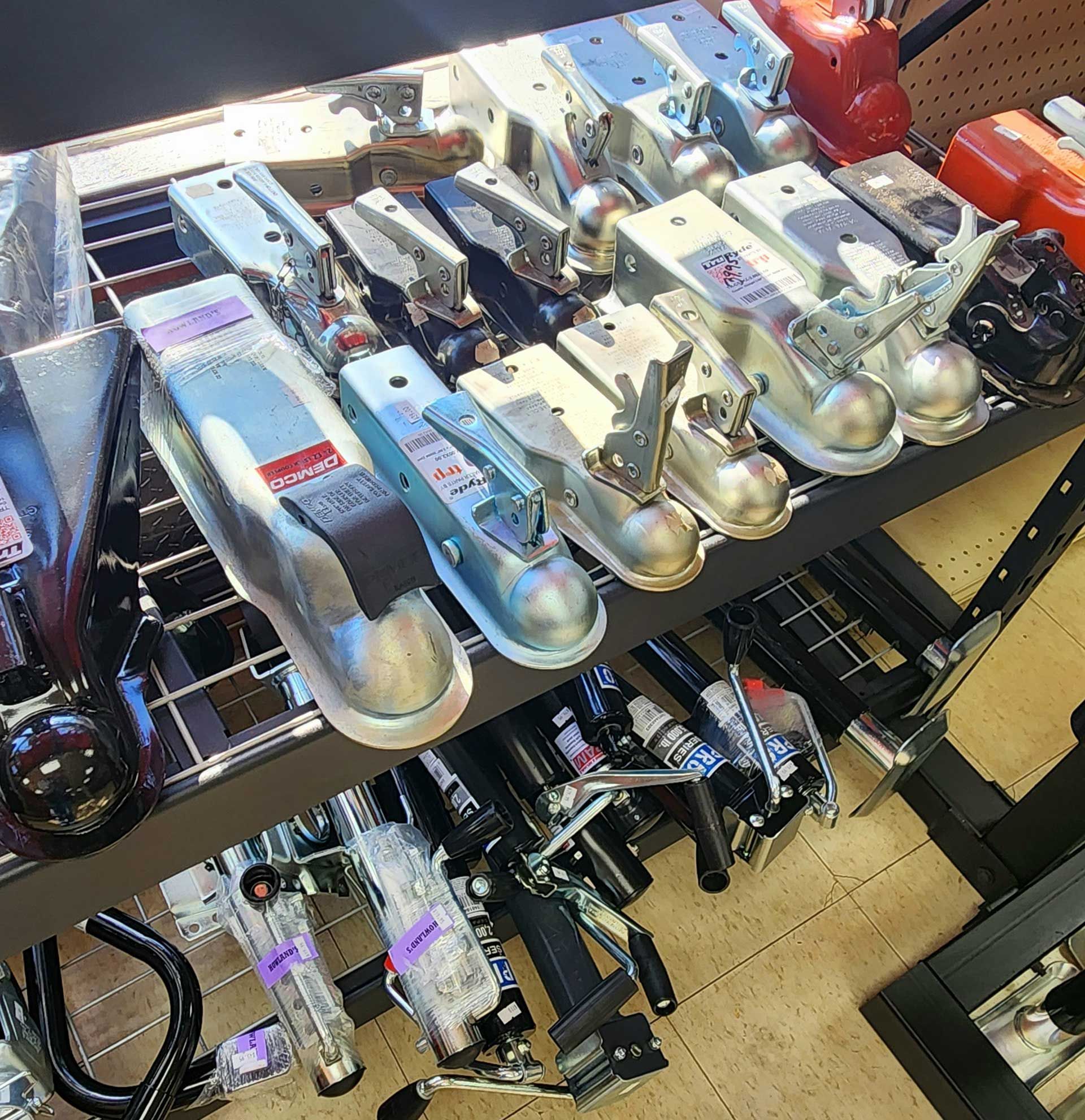 Assorted packaged flashlights and lanterns displayed on store shelves.