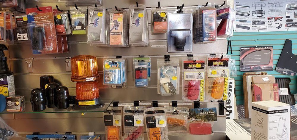 Store display of hanging hardware accessories and tools on wall shelves