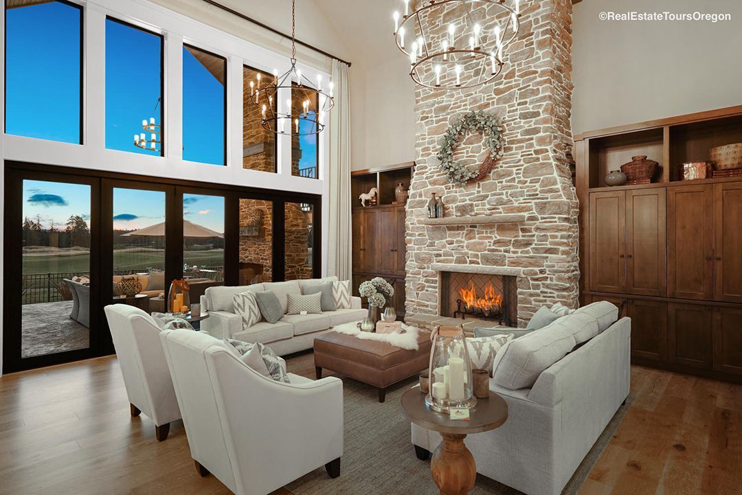A living room filled with furniture and a fireplace.