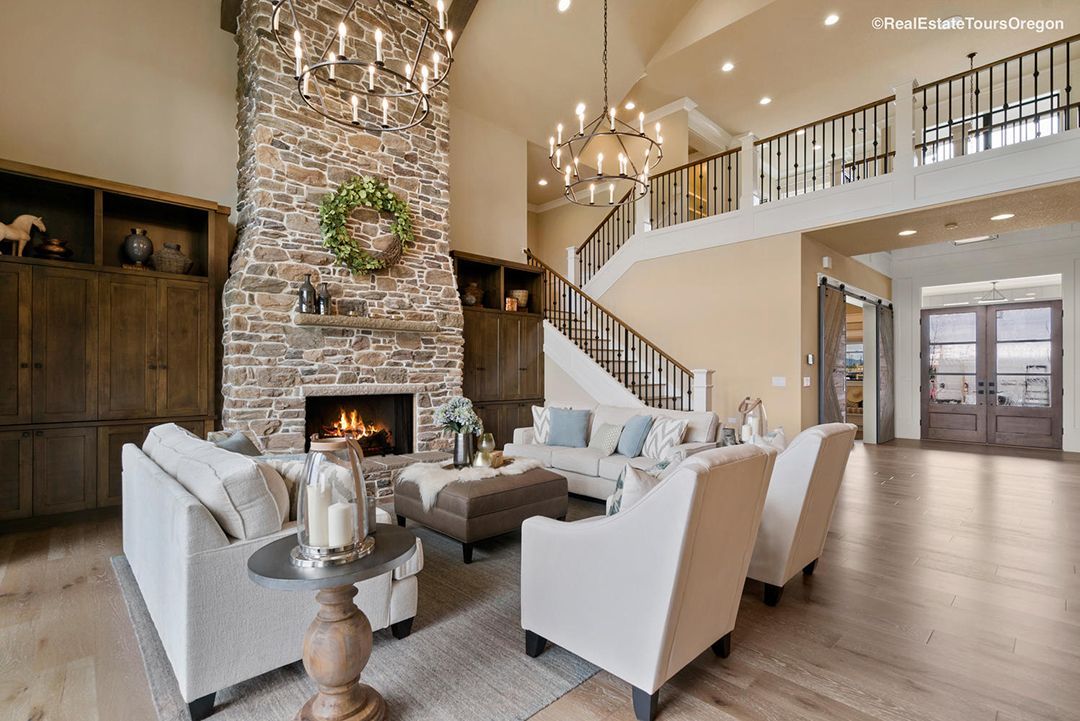 A living room filled with furniture and a fireplace.